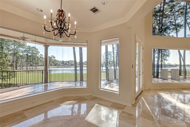 sunroom featuring visible vents and a water view