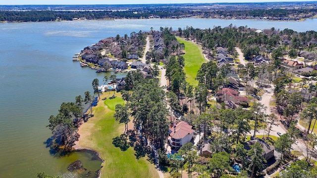 birds eye view of property featuring a water view and a residential view