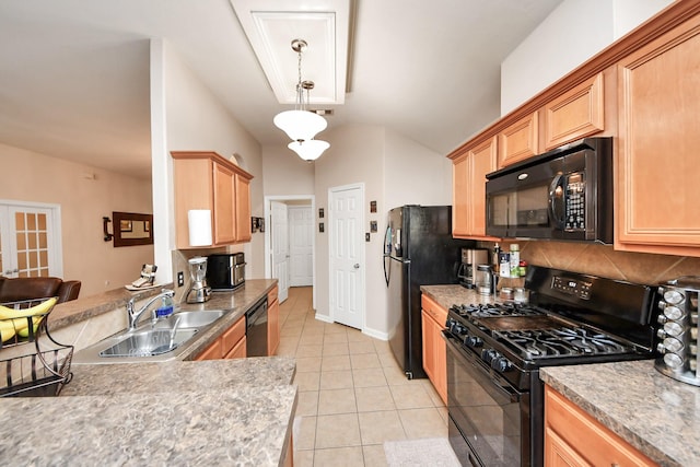 kitchen featuring backsplash, baseboards, light tile patterned floors, black appliances, and a sink