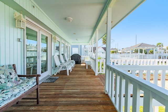 exterior space featuring a residential view and fence