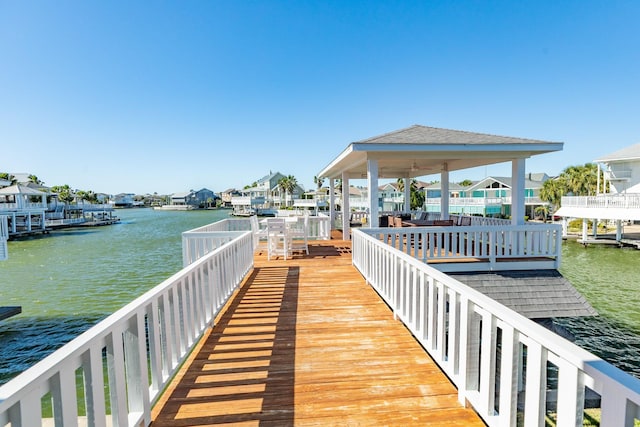 dock area with a water view