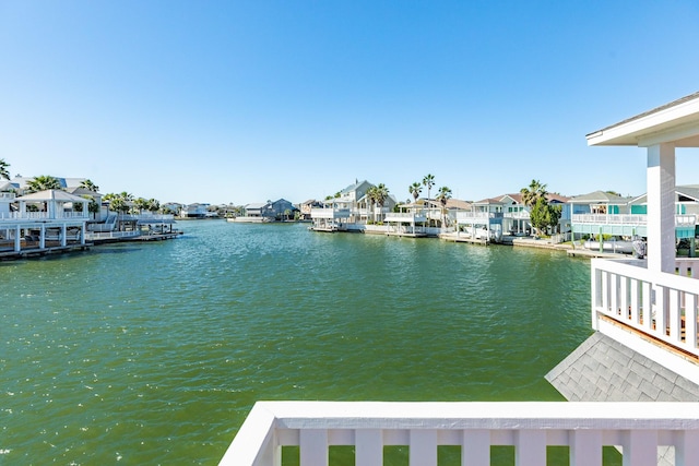 view of water feature featuring a residential view and a boat dock