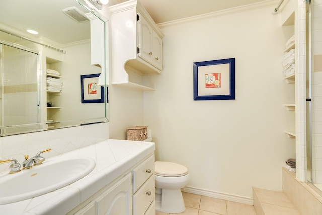 bathroom with tile patterned flooring, toilet, a tile shower, and ornamental molding