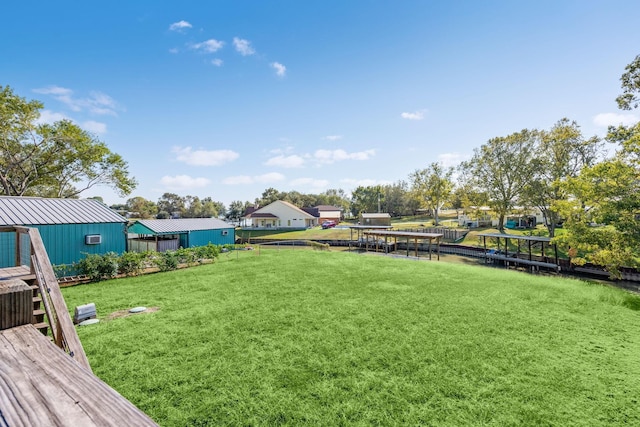 view of yard with a dock