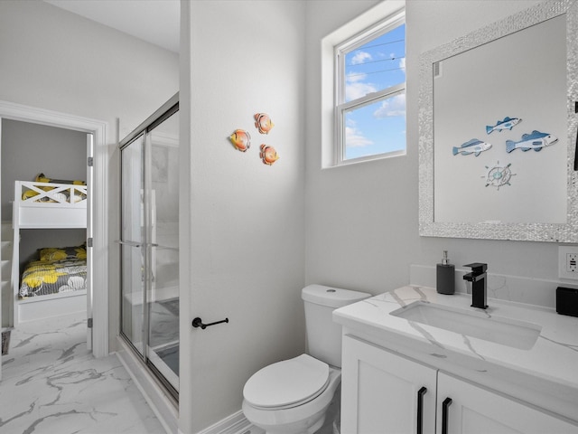 ensuite bathroom featuring toilet, marble finish floor, a stall shower, and vanity