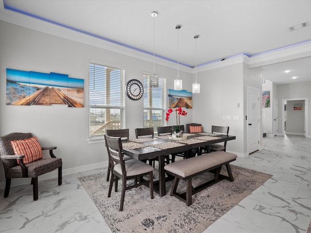 dining room with baseboards, visible vents, marble finish floor, and ornamental molding