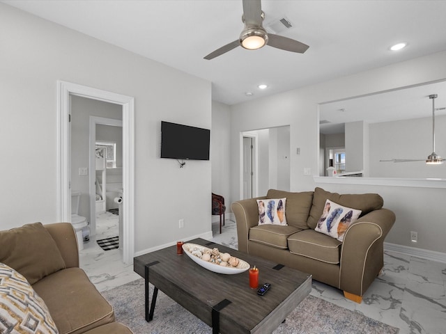 living room with recessed lighting, marble finish floor, baseboards, and a ceiling fan