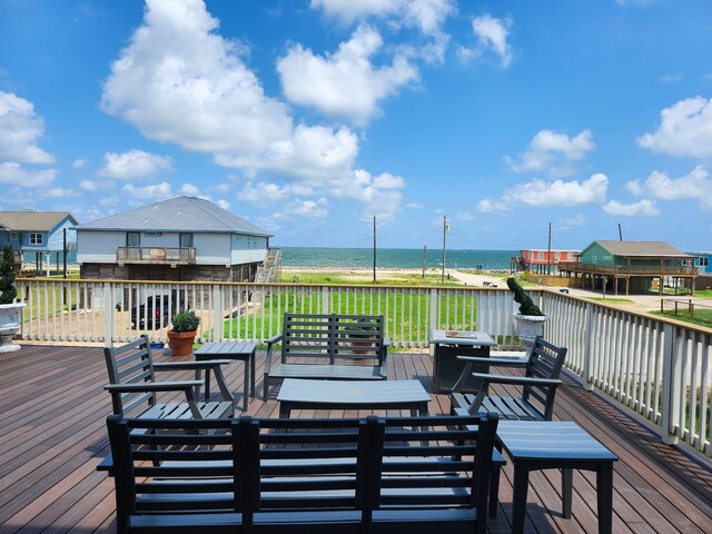 1018 Seashell Dr, Surfside Beach, TX 77541 - wooden deck featuring a water view