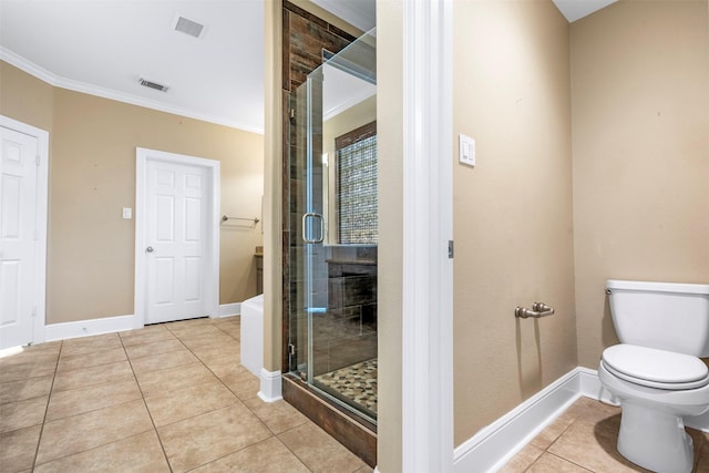 bathroom with visible vents, tile patterned flooring, a shower stall, crown molding, and toilet