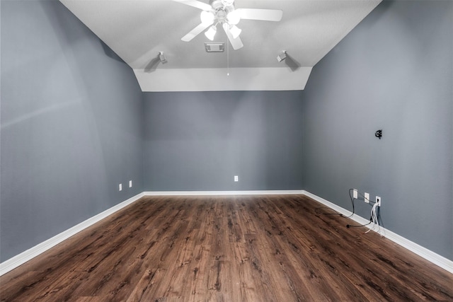 bonus room with vaulted ceiling, dark wood-style floors, baseboards, and ceiling fan