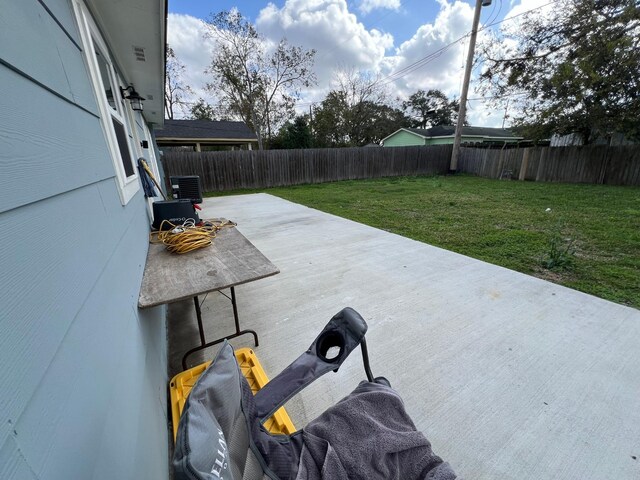 view of patio with a fenced backyard