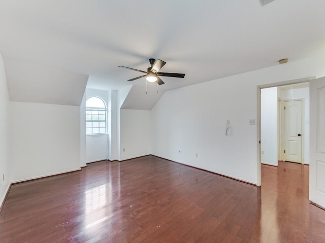 bonus room featuring vaulted ceiling, ceiling fan, and wood finished floors