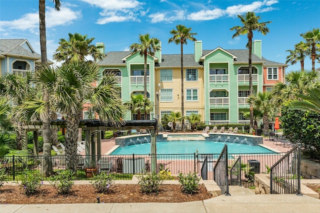 community pool with fence