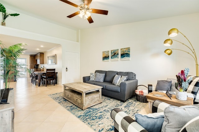 living room with recessed lighting, light tile patterned flooring, and a ceiling fan