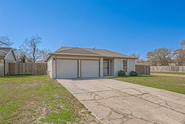 view of front of house featuring fence, concrete driveway, an attached garage, a front yard, and brick siding