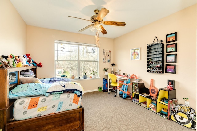 bedroom with carpet flooring, baseboards, and ceiling fan