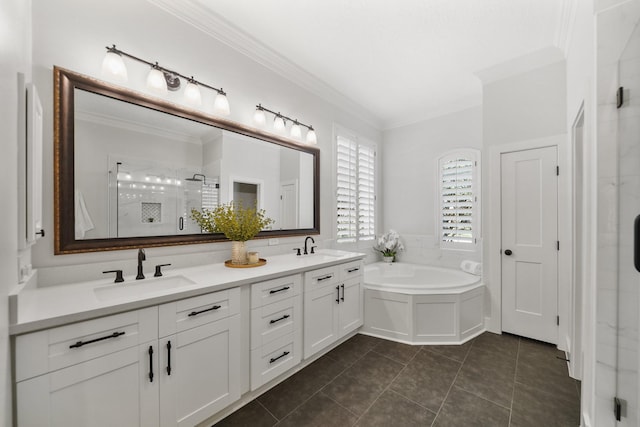 full bathroom featuring tile patterned flooring, a shower stall, ornamental molding, and a sink