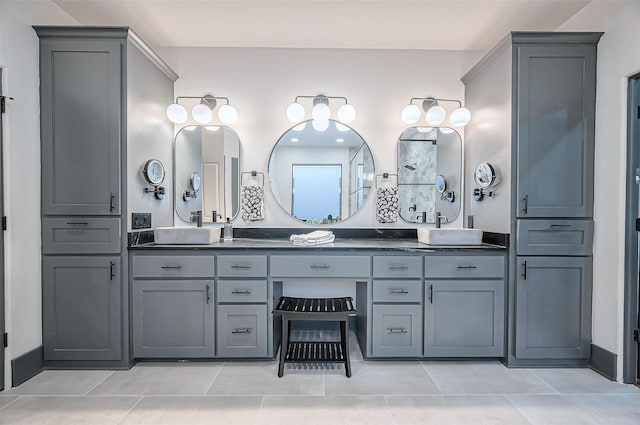 bathroom with vanity and tile patterned floors