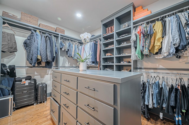 spacious closet with light wood finished floors