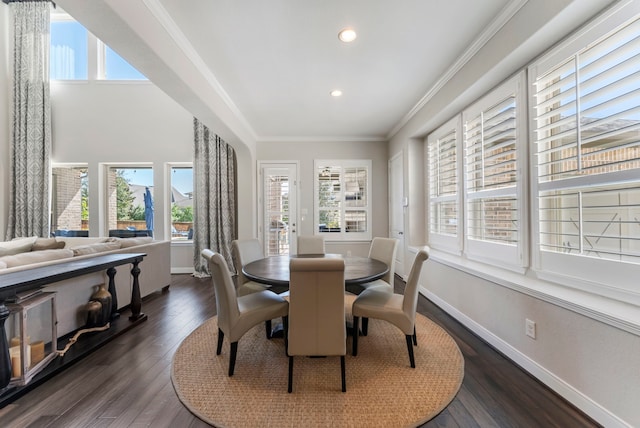 dining room with recessed lighting, dark wood-style floors, baseboards, and ornamental molding