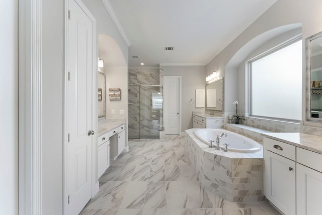 full bath featuring marble finish floor, a stall shower, ornamental molding, a bath, and vanity