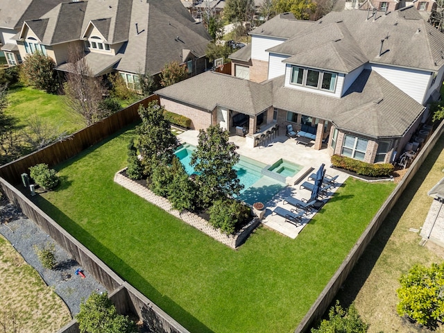 drone / aerial view with a residential view