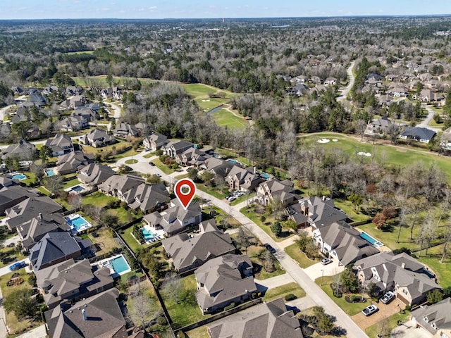 aerial view featuring golf course view and a residential view