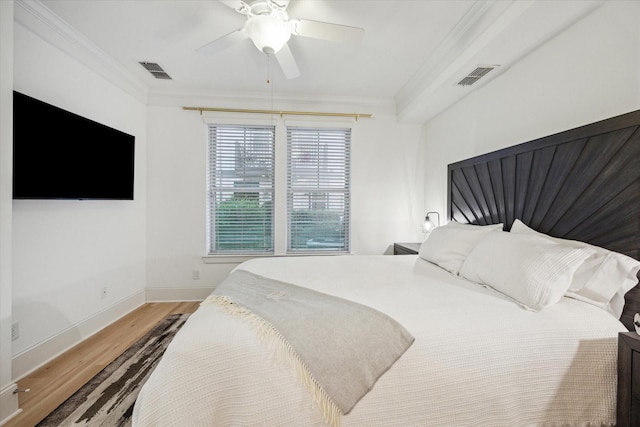727 Dorothy St, Houston, TX 77007 - bedroom featuring light wood-style floors, ornamental molding, baseboards, and a ceiling fan