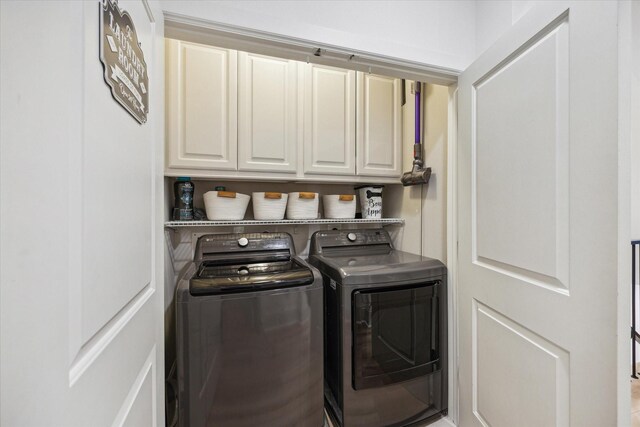727 Dorothy St, Houston, TX 77007 - laundry room with cabinet space and washing machine and dryer
