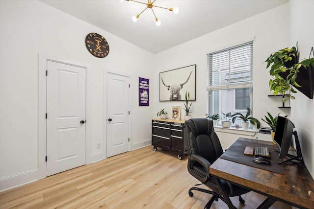 727 Dorothy St, Houston, TX 77007 - office featuring light wood-style floors, a chandelier, and baseboards