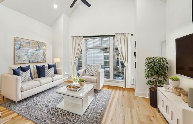 727 Dorothy St, Houston, TX 77007 - living room featuring high vaulted ceiling, ceiling fan, light wood-style floors, baseboards, and recessed lighting