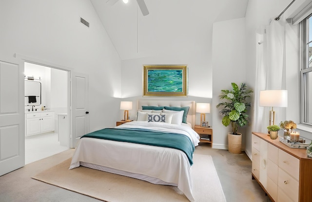727 Dorothy St, Houston, TX 77007 - bedroom with light colored carpet, connected bathroom, high vaulted ceiling, a ceiling fan, and baseboards