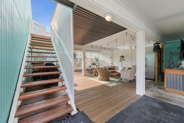 interior space featuring stairway and an outdoor hangout area