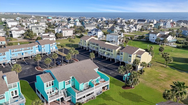 birds eye view of property featuring a residential view and a water view