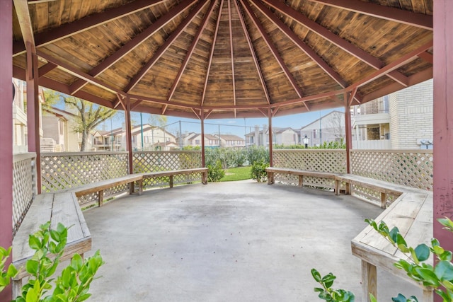 view of patio featuring a gazebo and a residential view