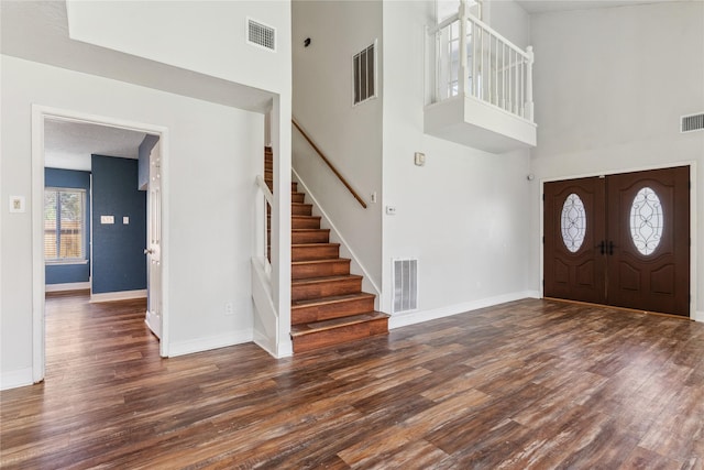 entrance foyer featuring wood finished floors and visible vents