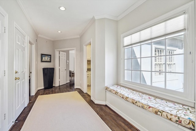 interior space featuring dark wood-style floors, recessed lighting, crown molding, and baseboards