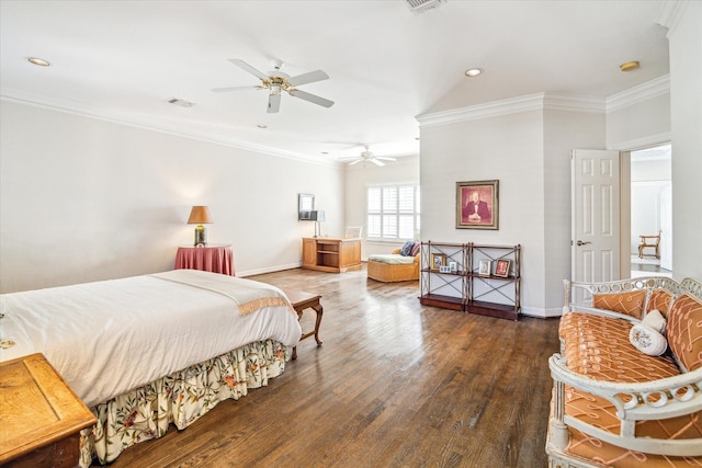 bedroom featuring crown molding, wood finished floors, visible vents, and baseboards