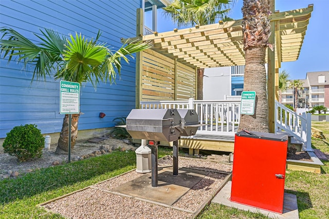 view of patio / terrace with a deck and a pergola