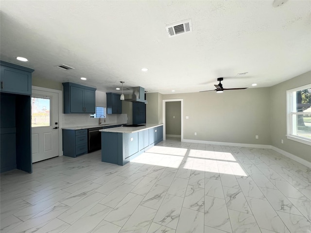 kitchen with visible vents, a sink, marble finish floor, wall chimney range hood, and open floor plan