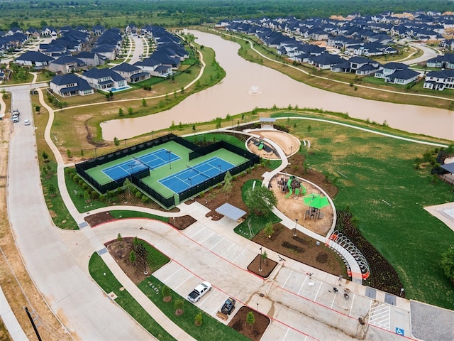 aerial view featuring a residential view and a water view