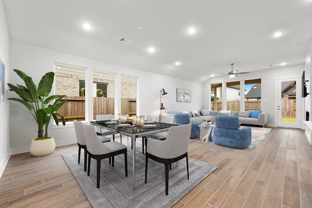 dining area featuring recessed lighting, visible vents, a healthy amount of sunlight, and light wood-style flooring