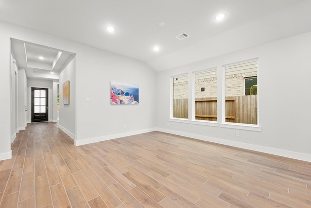 spare room with recessed lighting, visible vents, baseboards, and light wood finished floors