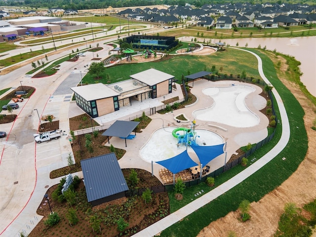 aerial view featuring a residential view and a water view