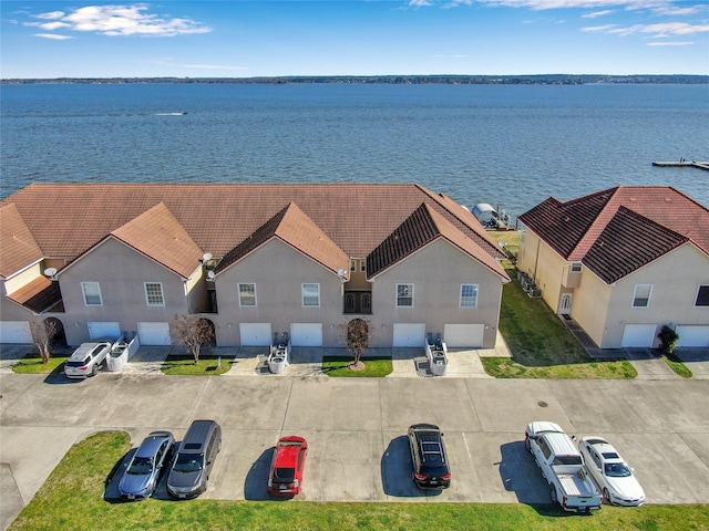 drone / aerial view with a water view