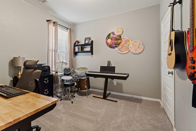 office with baseboards and carpet floors