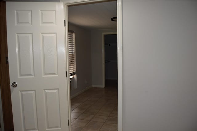 hallway with light tile patterned flooring