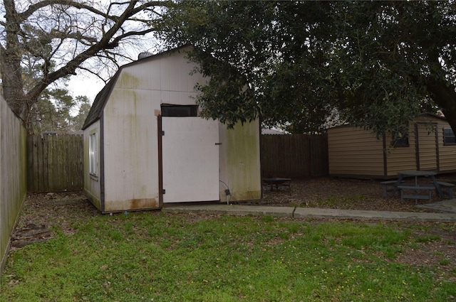 view of shed featuring a fenced backyard