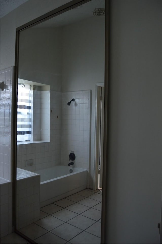 full bathroom with shower / bathtub combination and tile patterned flooring