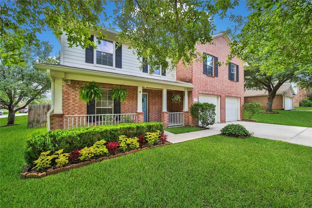 view of front facade featuring brick siding, a front lawn, a porch, concrete driveway, and an attached garage